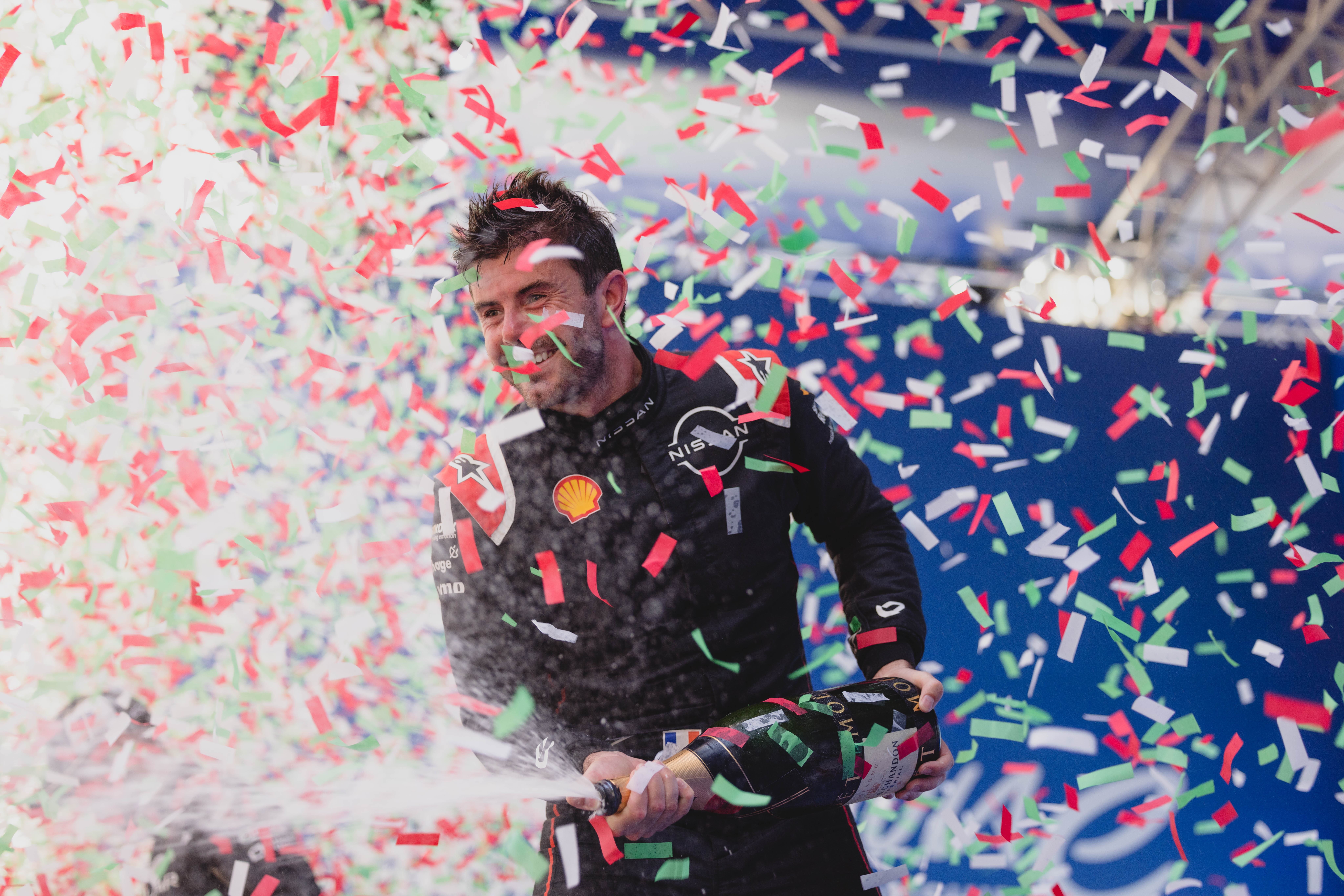 Formula e racer celebrating